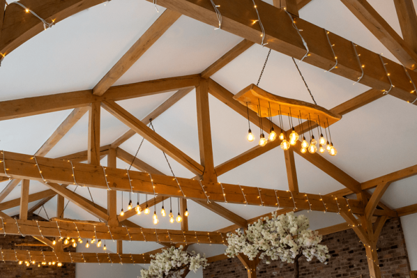 Side view of Oak King Post Trusses for a wedding Venue.